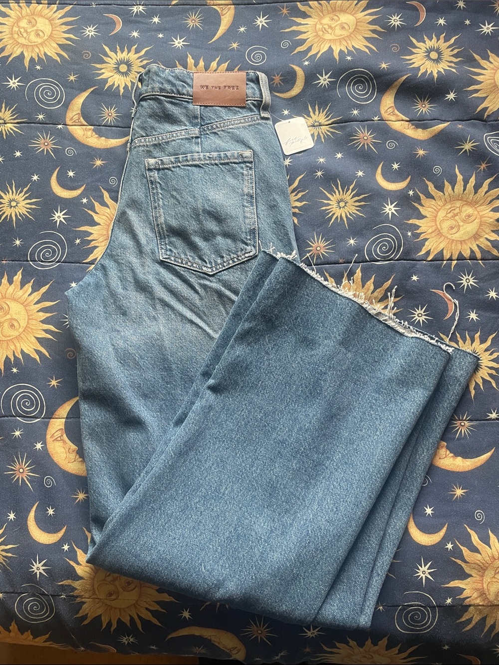 We The Free Light Blue Straight Leg High-Rise Jeans with Raw Hem